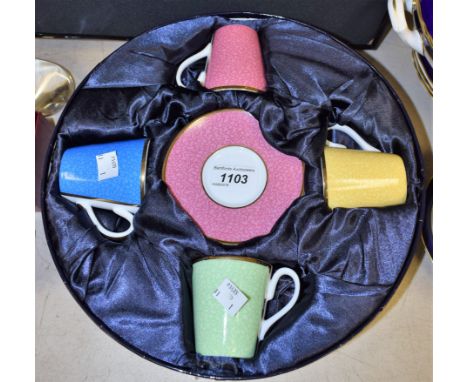 Ceramics - a Royal Worcester coffee set, harlequin colours, four coffee cans and saucers, in original circular box