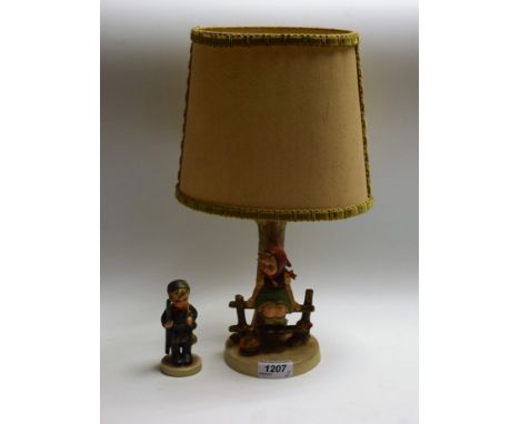 A Goebel figural table lamp, of a girl on a fence; another, figure, boy with ladder (2)