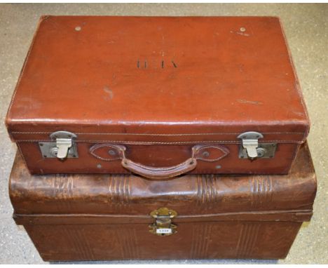 A 19th century cabin trunk; a leather suitcase (2)