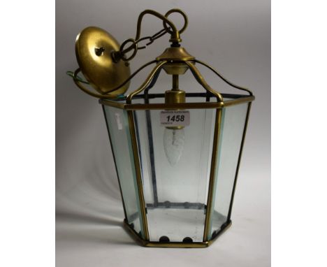 A brass hanging lamp