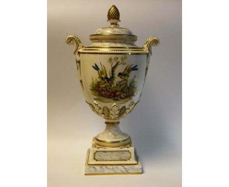 A Royal Worcester two handled pedestal ovoid vase and cover, painted by Terrance Nutt, signed with blue tits, upturned basket