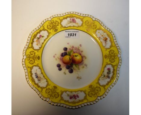 A  Royal Worcester shaped circular plate, painted by William Ricketts, signed, with apples and blackberries, the rim with six