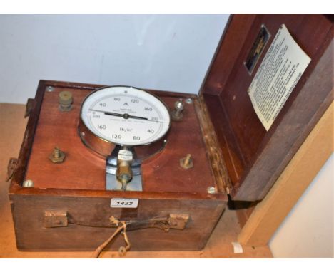 A chrome Test Rig-Tyre Pressure Gauge, white dial, with military issue arrow, 246/68, mahogany square box