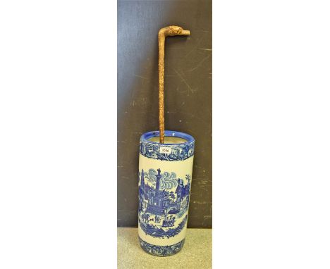 A blue and white stick stand; walking cane (2)