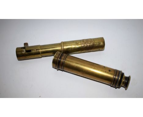 A Victorian brass telescope; a patent candle lamp