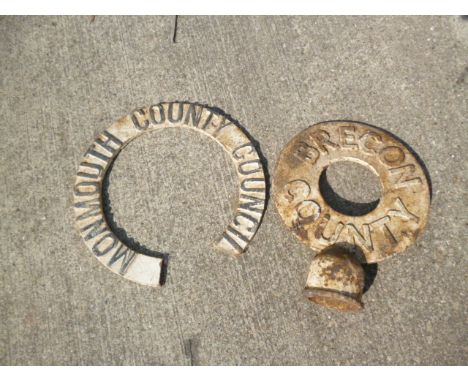 Original Welsh Finger Post Circular District Signs, a cast iron example inscribed Brecon County, the other an alloy example i