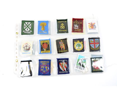 A collection of UK Scouting cloth and pin badges, to include Chester, East Devon, Church Army, Hinchingbrooke, Felthamand mor