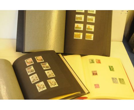 A collection UK and Ireland stamps, presented in five albums, mostly mint and post war, one box (5) 