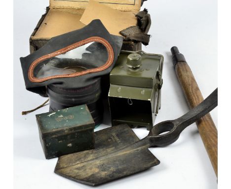 A WWII Entrenching Tool, marked BRADES 1944 with Broad Arrow to the shovel, marked WB 44 with broad arrow to the handle, toge