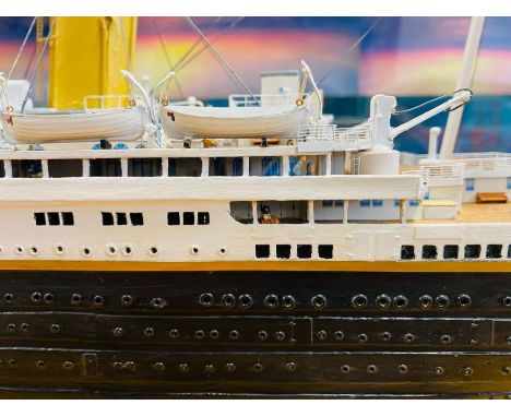 RMS Titanic. A wooden, kit-built, hand-painted 1/250 scale model, 2001, 95cm long, constructed from the 100-part Hachette pub