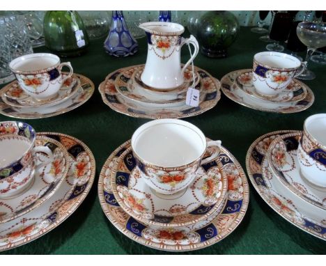 An Edwardian Salisbury part-tea service, comprising: trios, milk jug and sandwich plate.