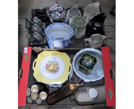 Two boxes containing a quantity of decorative ceramics to include: a Heron Cross hunting jug, a six bottle cruet set, an Imar