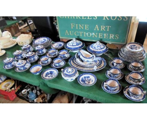 An extensive Booth's Real Old Willow part-dinner service, to include: covered tureens, graduated oval dishes, tea cups and sa