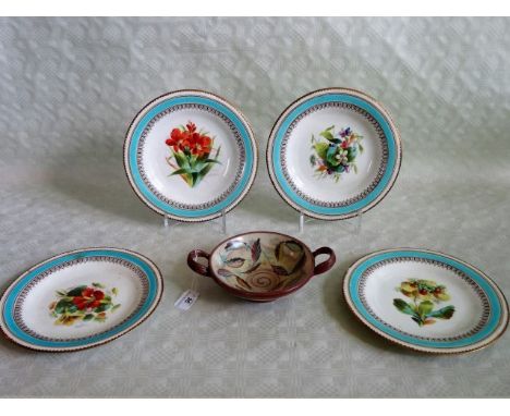 Four 19th century fruit plates, each having hand painted floral decoration on an ivory ground within a pale blue and gilt bor