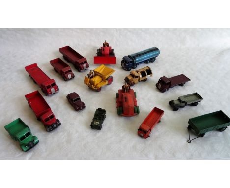 A quantity of mid-20th century play worn Dinky die-cast vehicles, to include a Blaw Knox bulldozer, a Heavy Tractor, a Foden 