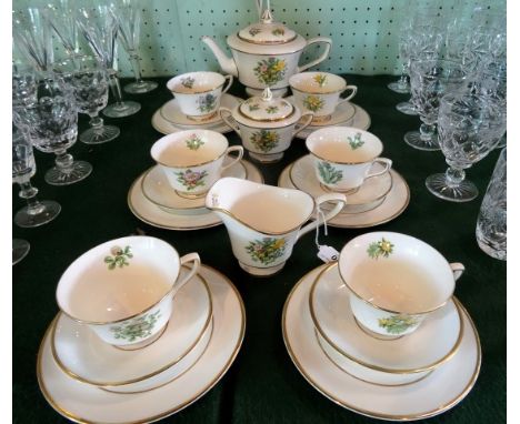 A late 20th century Royal Worcester tea service, commemorating the marriage of Prince Charles and Lady Diana in 1981, compris