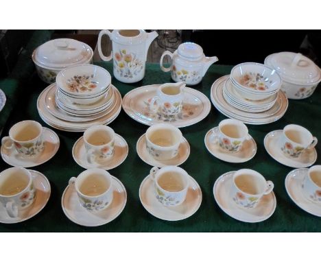 An extensive J & G Meakin Trend pattern dinner service, to include: covered tureens, dinner plates, tea cups and saucers, bow