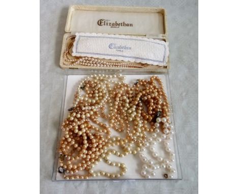 A cased three strand Elizabethan pearl necklace, together with a quantity of other pearl necklaces.