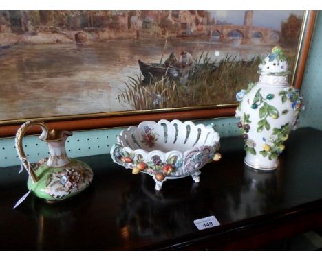 A 19th century Bloor Derby porcelain loop handled jug, having flower encrusted decoration with gilt finish on an ivory and gr