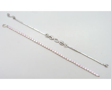 A silver and pink stone tennis bracelet and silver and white stone bracelet 