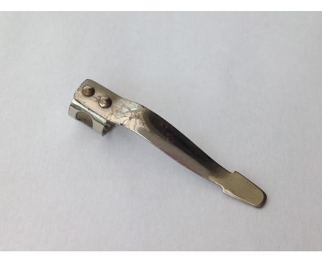 WW2 British RAF Pencil Clip Escape Compass. The clip could be balanced on a pencil point by placing it into the impressed dim