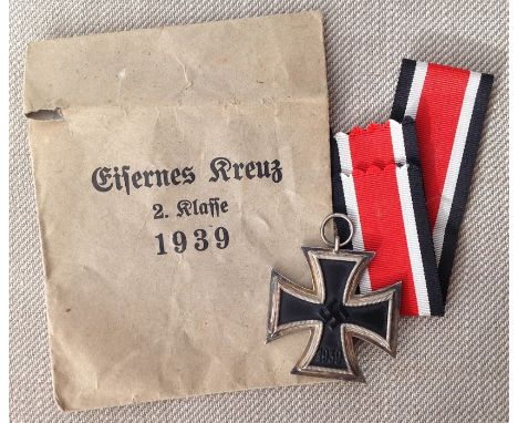 REPRODUCTION WW2 Third Reich Iron Cross 2nd Class 1939 by Floch. Ring marked "333". Complete with ribbon and packet.&nbsp;