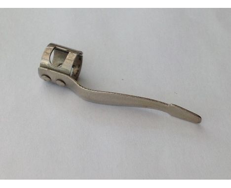 WW2 British RAF Pencil Clip Escape Compass. The clip could be balanced on a pencil point by placing it into the impressed dim