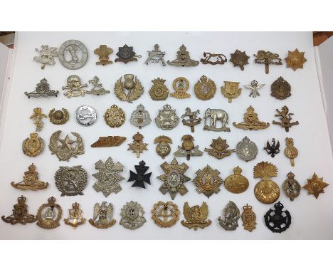 A collection of restrike WW1/WW2 British Army cap badges. Approx 60 in total to include&nbsp; RA, RAF, REME, Artists Rifles, 