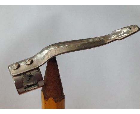 WW2 British RAF Pencil Clip Escape Compass. The clip could be balanced on a pencil point by placing it into the impressed dim