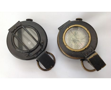 WW2 British Compass MKIII dated 1942, maker marked TG Co. Ltd. Serial number B 161037. Glass broken.&nbsp; Along with an empt