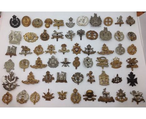 A collection of restrike WW1/WW2 British Army cap badges to include Leicesters, FANY, RA, Notts &amp; Derbys, Recce Corps, DC