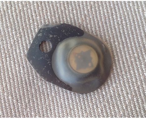WW2 British RAF Escape Compass in rubber pouch. With hole for wear on a cord around the neck. Could be swallowed in the event