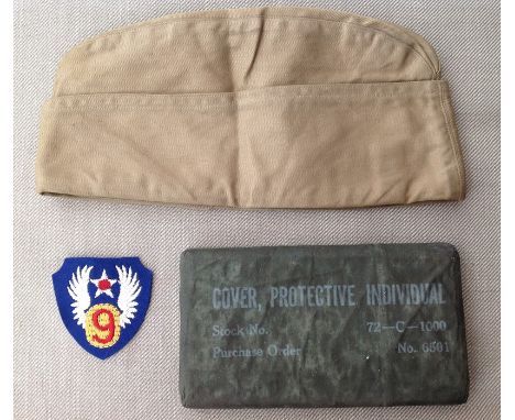 WW2 US Army, Cover, Protective, Individual. (Anti - Gas Cape) Unopened, sealed packet, USAAF 9th Air Force shoulder sleeve in