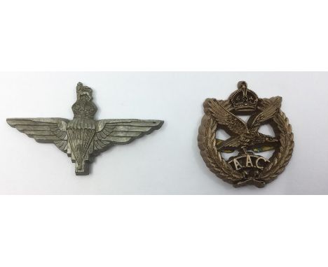 WW2 British Plastic Parachute Regiment cap badge, un-marked and missing one lug and an Army Air Corps plastic cap badge compl
