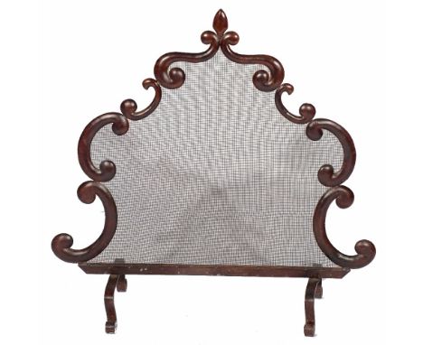 An Edwardian brass fireguard 138cm, a brass coal scuttle, a fire screen and various fire implements
