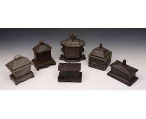 A lead square tobacco jar with pineapple finial and hunting scenes and five other cast iron tobacco jars and covers, 18th/19t