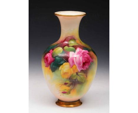 A Royal Worcester baluster vase pattern 290, painted with sprays of roses, 27cm high