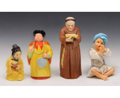 Three Royal Worcester candle snuffers including a monk, a Chinaman and Chinese lady and a Royal Worcester model of a turbaned