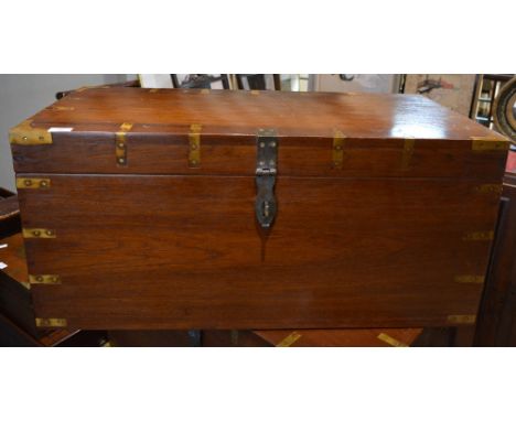 A hardwood campaign type trunk with brass mounts, 89cm