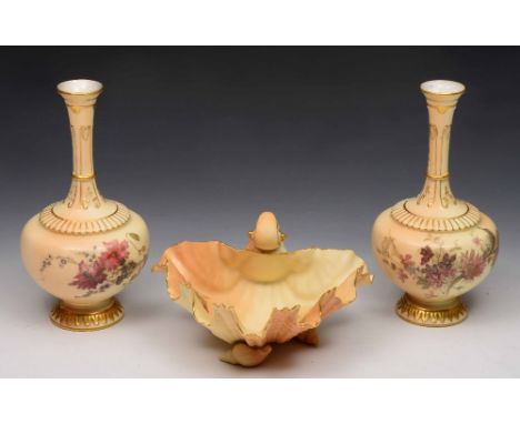 A pair of Royal Worcester blush ivory vases pattern 1620 painted with flowers and with raised gilt necks, 22cm and a Royal Wo