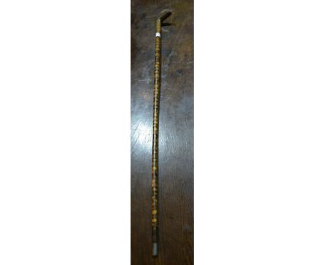 A Victorian horn walking stick with whistle to the handle