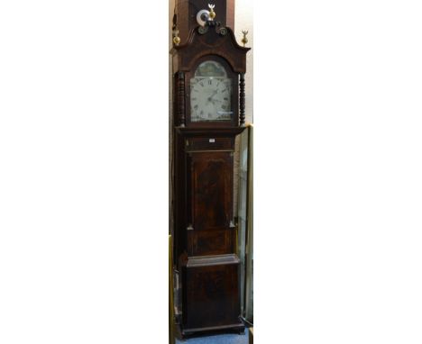 A Victorian mahogany and inlaid longcase clock with arch painted dial, signed William Johnson,having an eight day movement.