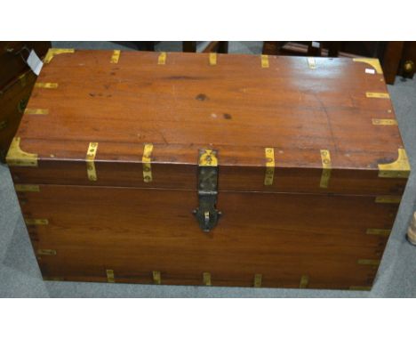 A hardwood campaign type trunk with brass mounts, 91cm