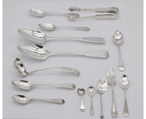A large collection of fourteen pieces of 19th century silver cutlery, including spoons, a sauce ladle, sugar tongs and mustar