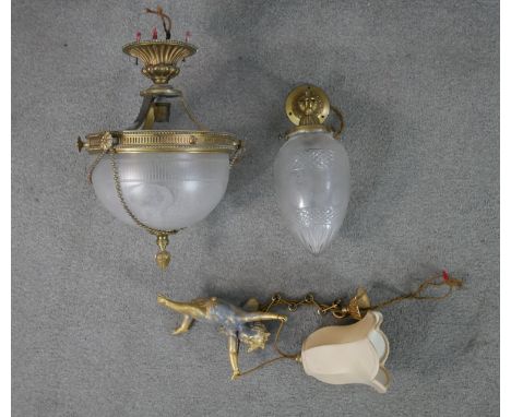 Three early 20th century ceiling lights, including a hanging gilt spelter cherub light with silk flower form shade and two gi