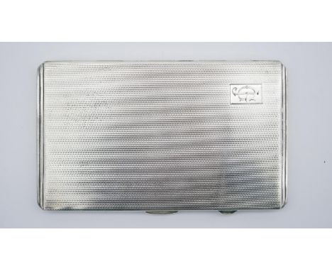 A large engine turned silver cigarette case with gilded interior, rectangular cartouche inscribed with monogram. Hallmarked:B