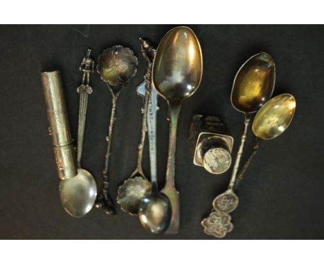 A collection of silver and white metal items, including two Chinese silver coffee spoons with gourd finials and cherry blosso