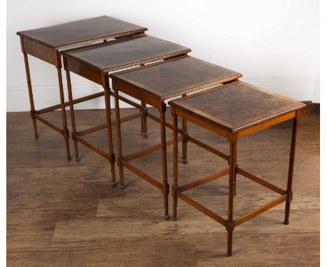 Nest of four walnut occasional tables56cm x 41cm x 63cm high  With scratches and a few light marks.