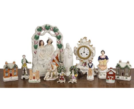 Group of ceramics to include Staffordshire figures, a clock, flatback cottages, Meissen figure etc  At present, there is no c