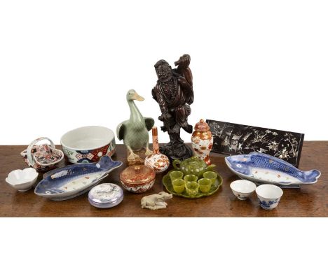 Collection of pieces Chinese and Japanese, to include a wooden model of Li Tieguai, depicted with a crutch, one foot balancin